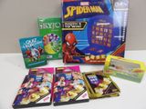 a spider - man board game and other games on the table