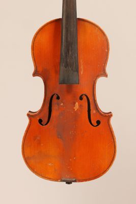 a close up of a violin with a bow on a white background