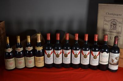 several bottles of wine are lined up on a table