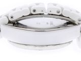 an image of a close up of a wrist watch on a white surface