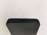 a close up of the back of a black iphone with a white background
