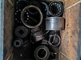 a wooden box with a bunch of different types of pipes