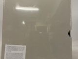 the back of a white box with a label on it