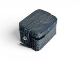 an image of a small blue box with a handle on a white background