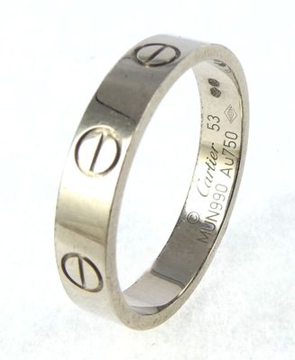 an image of a ring with the word love engraved on it