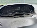 a close up of a car dashboard with a speedometer and gauges