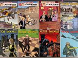several comics are lined up in a row on a table
