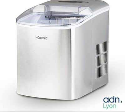 an image of a small ice maker sitting on top of a counter