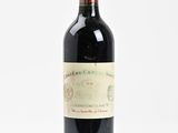 a bottle of wine that is sitting on a table