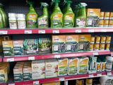 many bottles of cleaning products on the shelves in the store