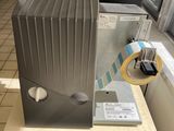a machine that is sitting on a counter in a room