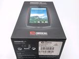 a box with a phone inside of it on a white surface