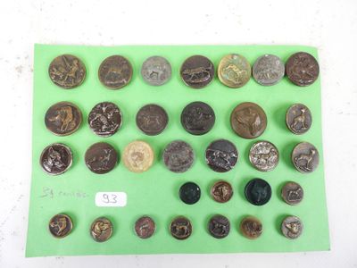 a lot of old coins on a green surface