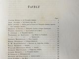 a close up of an old book with a bunch of writing on it