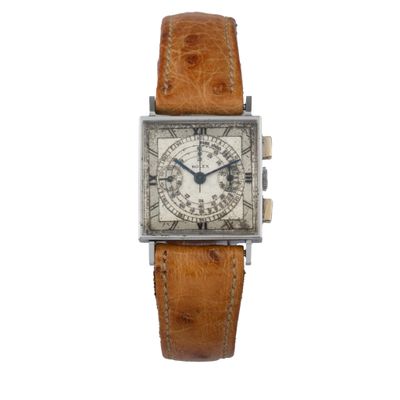 a close up of a watch on a white background with a brown strap