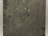 a close up of a piece of metal on a white surface