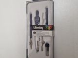 a set of tools in a plastic case on the wall