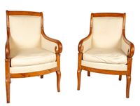Paire de bergère en acajou mouluré et sculpté, les supports …