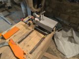 a machine that is sitting on top of a wooden table