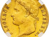 Gros plan sur une pièce d'or ornée d'une tête de femme