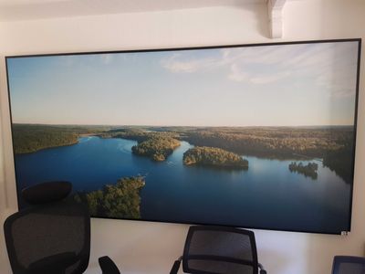 a picture hanging on the wall of a home office