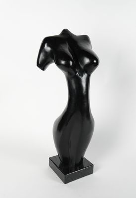 a black sculpture of a woman ' s torso on a black base