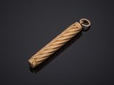 a close up of a wooden object on a black background
