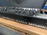 an image of a dj controller sitting on top of a box