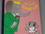 a pink book with a picture of an elephant and a baby elephant on it