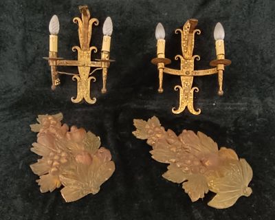 pair of antique wall sconces with carved flowers and leaves