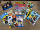 de nombreux livres pour enfants qui se trouvent sur la table