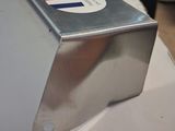 a silver box with a red, white, and blue sticker on it