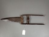 a knife that has a tag attached to it