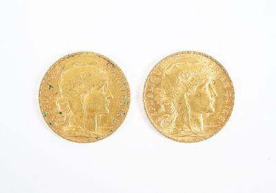 deux souverains d'or, dont l'un représente la tête d'une femme et l'autre celle d'un homme