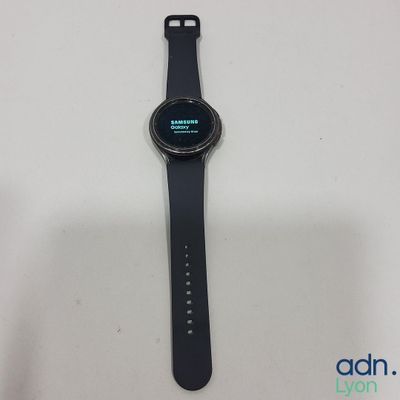 a close up of a smart watch sitting on a table