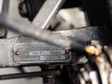 a close up of a metal plate on a motorcycle