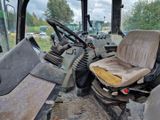une image représentant un tracteur équipé d'un siège et d'un volant