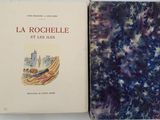 two books that are sitting on a table