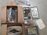 a box of assorted items sitting on the floor