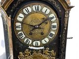 a clock that is sitting on top of a table