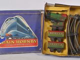a box with a train set in it and a box with a train set in it
