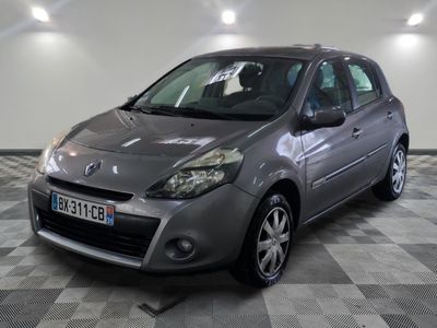 a picture of a grey car parked in a garage