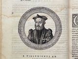 an old book with a picture of a man in a hat on it