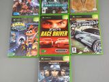 a bunch of video games sitting on top of a table
