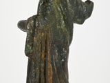 bronze statue of a woman holding a bird on a black base