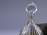 a glass decanter with a glass stopper on it