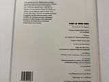 a white book with a black and white image on it