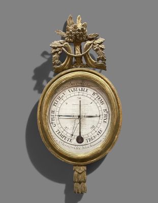 a clock that is hanging on the wall with a clock on it