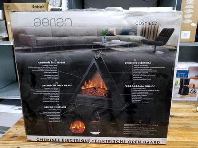 an open box of a fireplace sitting on top of a wooden table