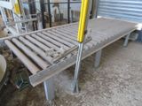 a picture of a conveyor belt in a warehouse